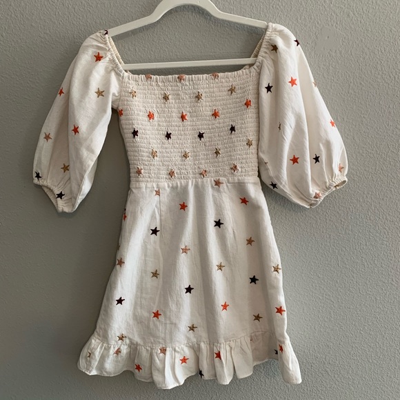 White dress with red & blue stars. Front cutout and side zipper. Fits like xs/s - Picture 5 of 7